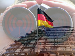 Blick vom Bundestag durch ein Fernglas auf die deutschen Handelsvereinbarungen.