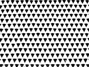 Ein Muster aus ausgestanzten Dreiecken.