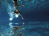 Das Bild zum McKinsey Recruiting-Event »Eintauchen« zeigt einen Schwimmer beim Tauchen.