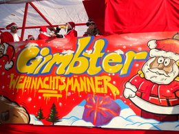 Ein Karnevalswagen zum Thema Weihnachtsmänner von Gimbte.
